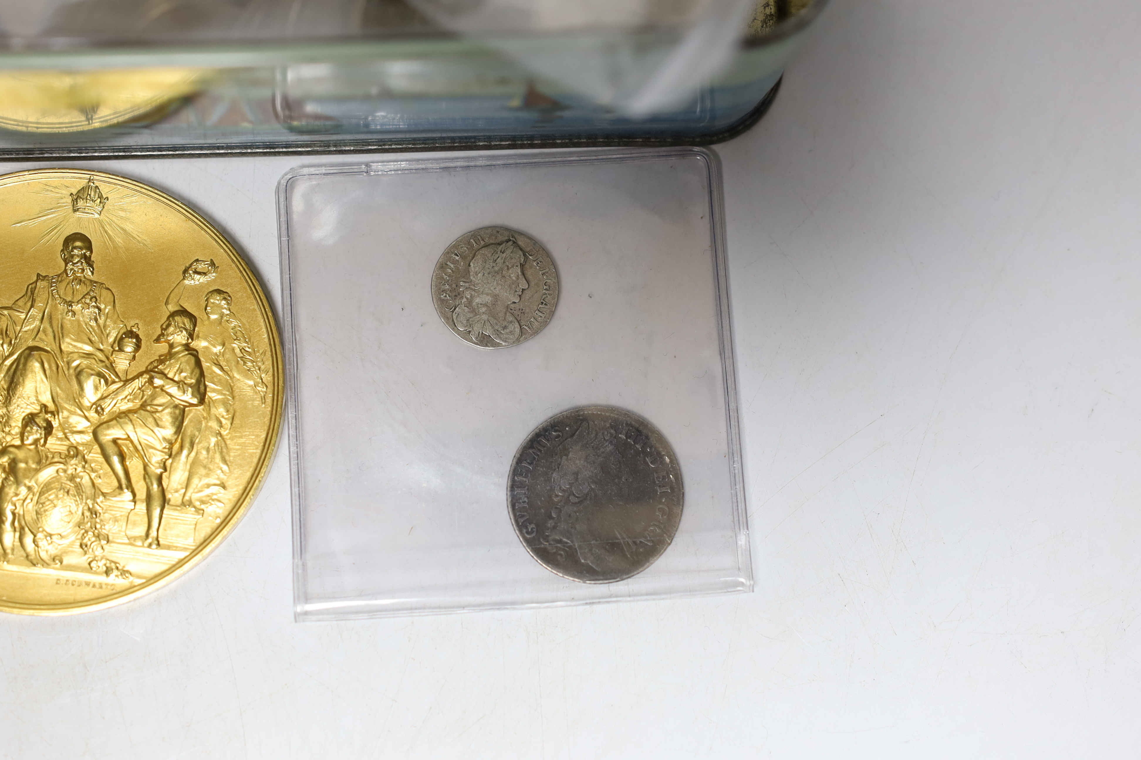 A collection of British coins including Charles II four pence 1680, William III shilling 1696, George III shilling 1787, various pennies, commemorative medals including Franz Joseph I 40th anniversary of his reign